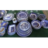 A collection of blue and white potter, to include examples by Woods, Copeland Spode,