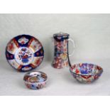 Four items of Japanese Imari porcelain, to include: two bowls,