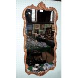 A gilt framed Regency style wall mirror, 95cm x 47cm.