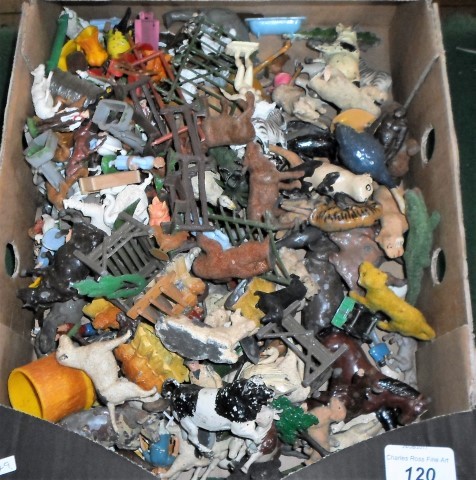A box containing a good quantity of early 20th century farmyard animals and related accessories,