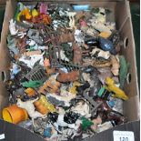 A box containing a good quantity of early 20th century farmyard animals and related accessories,