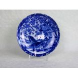 An early 20th century Japanese circular plate, having underglaze blue and white decoration,
