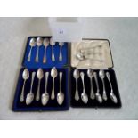 Two cased sets of six silver teaspoons,