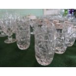 A quantity of cut glass drinking vessels, to include: champagne flutes, wine glasses and tumblers.