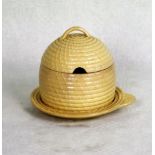A 19th century Wedgwood honey/preserve pot, modelled as a beehive, cream glaze finish,