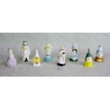 Eight Royal Worcester porcelain candle snuffers, to include: Punch, Mob Cap, Old Woman,