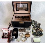 A contemporary jewellery box containing a mixed lot of costume jewellery, watches and other items.