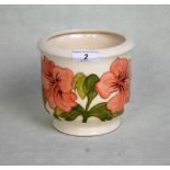 A Moorcroft planter in the Peach Hibiscus pattern, having tube-lined decoration on a cream ground,