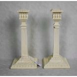 A pair of Sowerby & Company Queen Anne-style machine pressed 'Queensware' fluted column