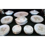 A Royal Doulton part-dinner service in the Yorkshire Rose pattern, number H5050,