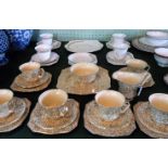 A Royal Winton Grimwades part-tea service, comprising: six trios, sandwich plate,