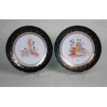 Two late 19th century porcelain wall plates,