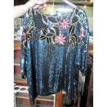 A Frank Usher sequin embellished evening blouse, size large.
