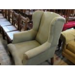 A Victorian wing backed armchair, 76cm wide.
