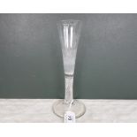 An early 19th century tall wine glass,