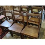 A set of six oak bar back dining chairs, 47cm wide.