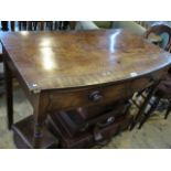 A Victorian bow fronted two drawer side table, 100cm.