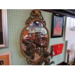 A gilt framed 18th century-style mirror, 88cm x 48cm.