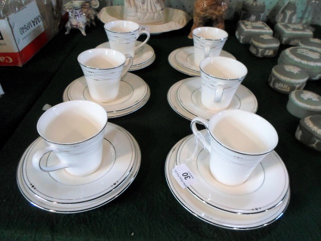 Royal Doulton Fascination pattern part-tea set, a set of six trios, dated 2006.