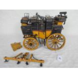 A hand built wooden model of a stagecoach titled 'The Commodore, London', 29cm in length, (AF).