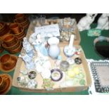 Two boxes containing a quantity of decorative ceramics and glass,