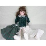 An early 20th century Armand Marseille bisque headed doll,