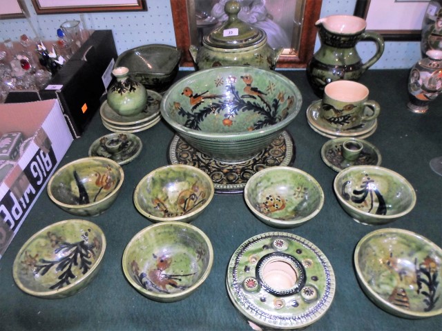A quantity of Portuguese green glazed and hand painted tableware, to include: covered tureen, bowls,