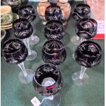 A set of ten cranberry and clear crystal Hock glasses, 19.6cm.
