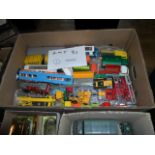 A quantity of play worn die-cast commercial vehicles, to include examples by Dinky, Matchbox,