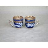 A pair of early 19th century porcelain teacups,