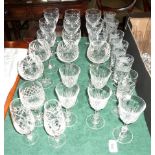 A quantity of cut glass and other drinking vessels to include: hock glasses, wine glasses,