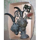 A pair of Continental metalware ewers,