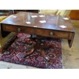 A Regency mahogany two drawer sofa table on out-swept quatrefoil base, 69cm wide.