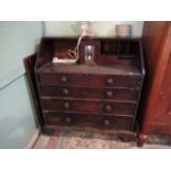 An early 19th century mahogany bureau, having four drawers on block supports, 92cm wide.