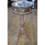 A reproduction walnut French-style marble top circular table,