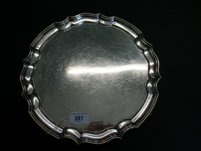 A mid 20th silver salver of scalloped edge form, Sheffield hallmarks 1967, 30cm diameter.