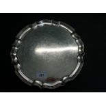 A mid 20th silver salver of scalloped edge form, Sheffield hallmarks 1967, 30cm diameter.