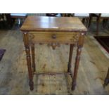 An early Victorian oak single drawer side table in the manner of Richard Bridgens,