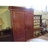 A Dutch mahogany two drawer armoire on front cabriole supports, 218cm x 147cm.