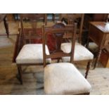 A set of six oak upholstered dining chairs on turned supports, 47cm wide.