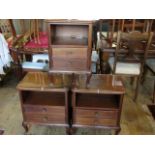 Two mahogany bedside cabinets, each 50cm wide, together with another, similar.