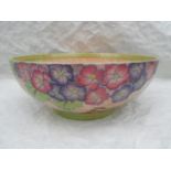 A monumental 1930s Crown Ducal bowl, designed by Charlotte Rhead in the 3797 Hydrangea pattern,