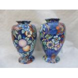 A pair of 1920s Wood & Sons Bursley Ware baluster vases, designed by Charlotte Rhead,