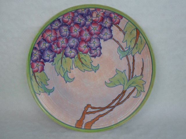 A large 1930s Crown Ducal Wall plaque, designed by Charlotte Rhead in the 3797 Hydrangea pattern,