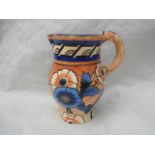 A 1920s Wood & Sons Bursley Ware jug, designed by Charlotte Rhead in the 1793 pattern,