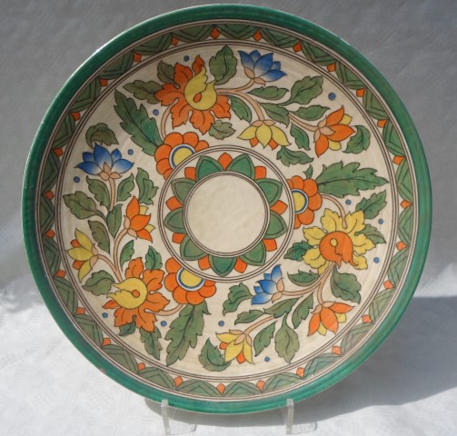 A large 1930s Crown Ducal Wall plaque, designed by Charlotte Rhead in the 5983 Ankara pattern,