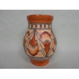 A 1930s Crown Ducal vase, designed by Charlotte Rhead in the 2682 Brown Lotus leaves pattern,