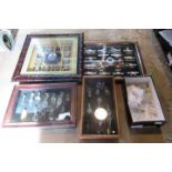 A collection of glass decanter stoppers, to include two framed presentations,