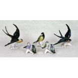 Five Karl Ens bird figurines, to include: two swallows, two fledglings and a Great Tit.
