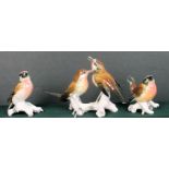 Three Karl Ens bird figure groups, the tallest 12cm.